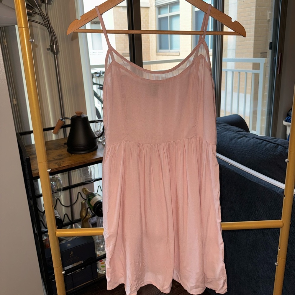 Super soft dreamy pale pink babydoll dress in size Medium.